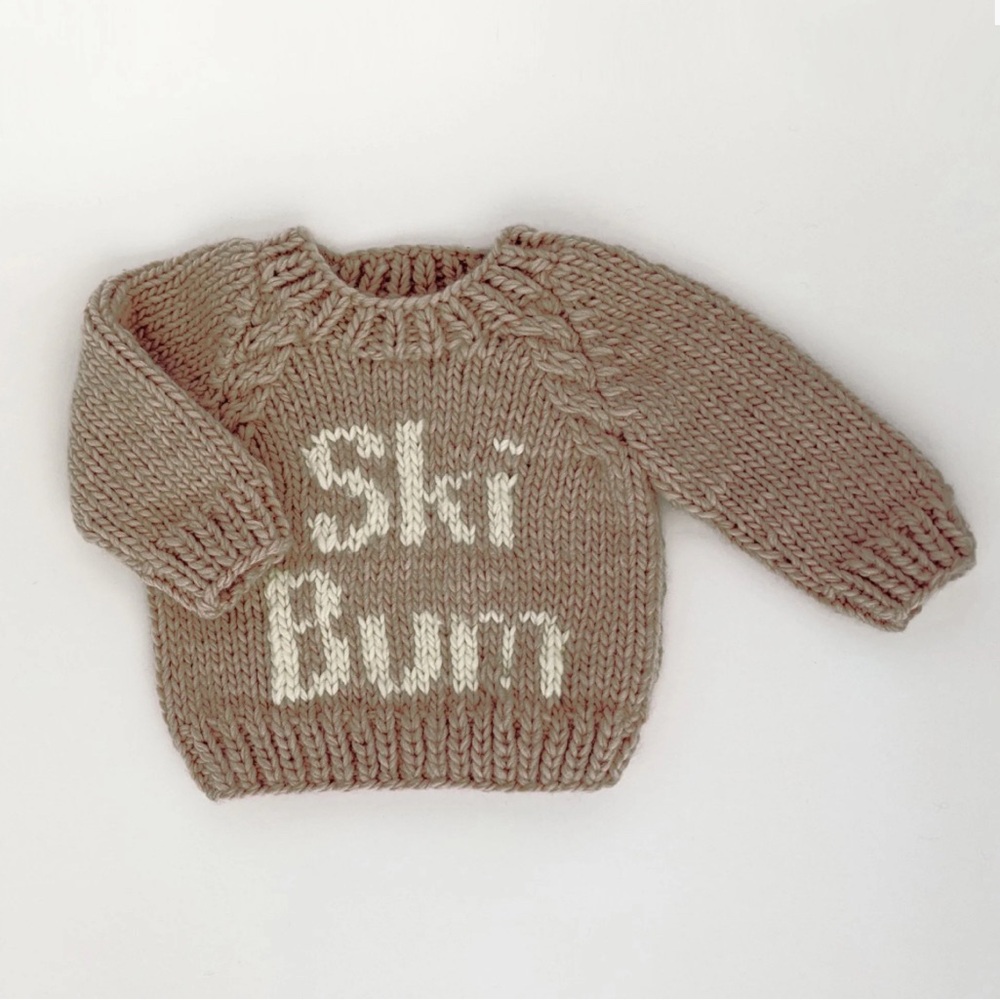 Ski Bum infant sweater! Never worn, just used for our baby’s birth announcement
